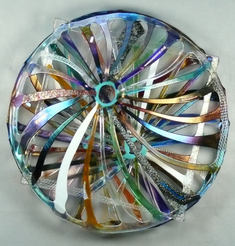 Lisa Chernoff: Experimental and functional kiln fused glass sculpture.